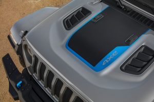 The hood graphic on the 2021 Jeep® Wrangler Rubicon 4xe includes a Surf Blue accent.