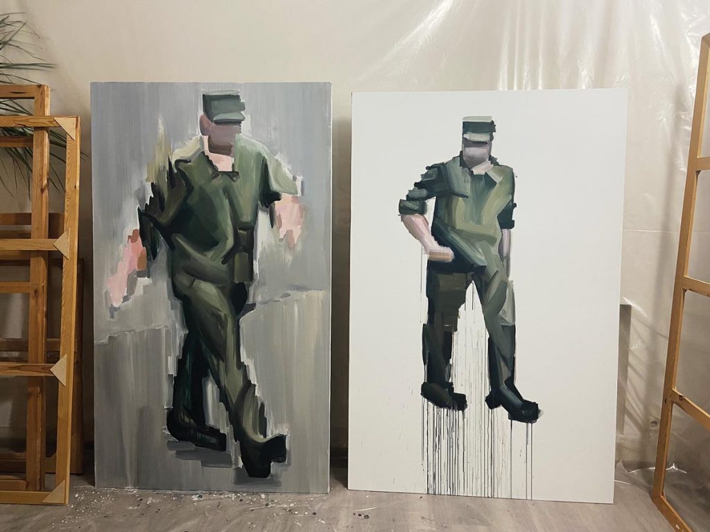 A pair of paintings of Ukranian soldiers from a series called Covert Surveilance are the last works Khomenko made before Russia invaded her home country in February